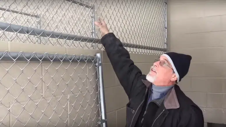 Adding chain link fabric to kennel framing