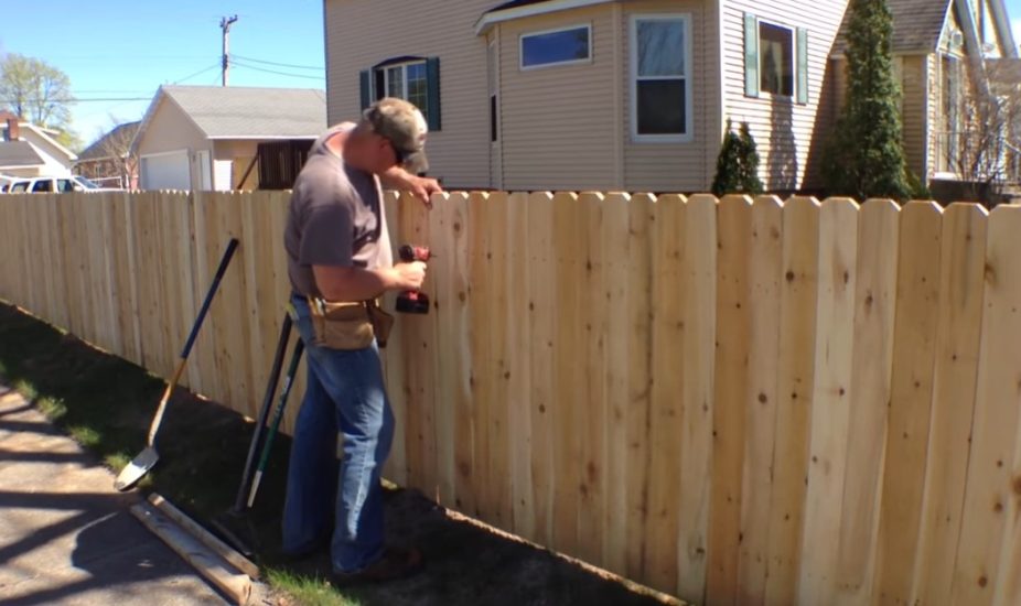 installing wooden fence